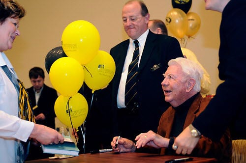 Dianne Fendler has her book signed by Mort Walker